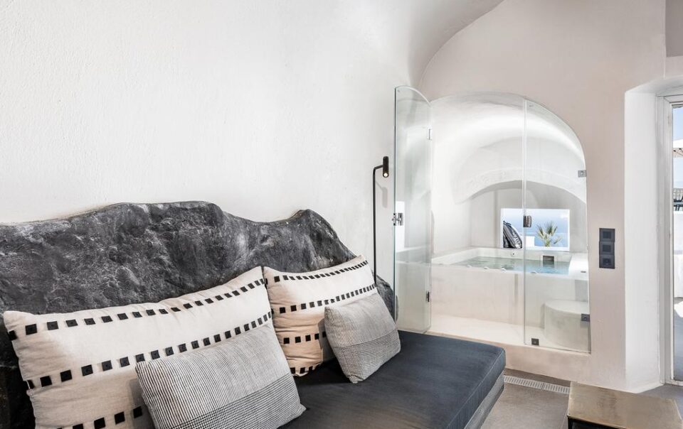 Luxury cave suite with caldera view in Santorini, ideal for a honeymoon stay